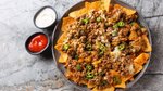 Loaded beef nachos: The ultimate easy footy finals snack